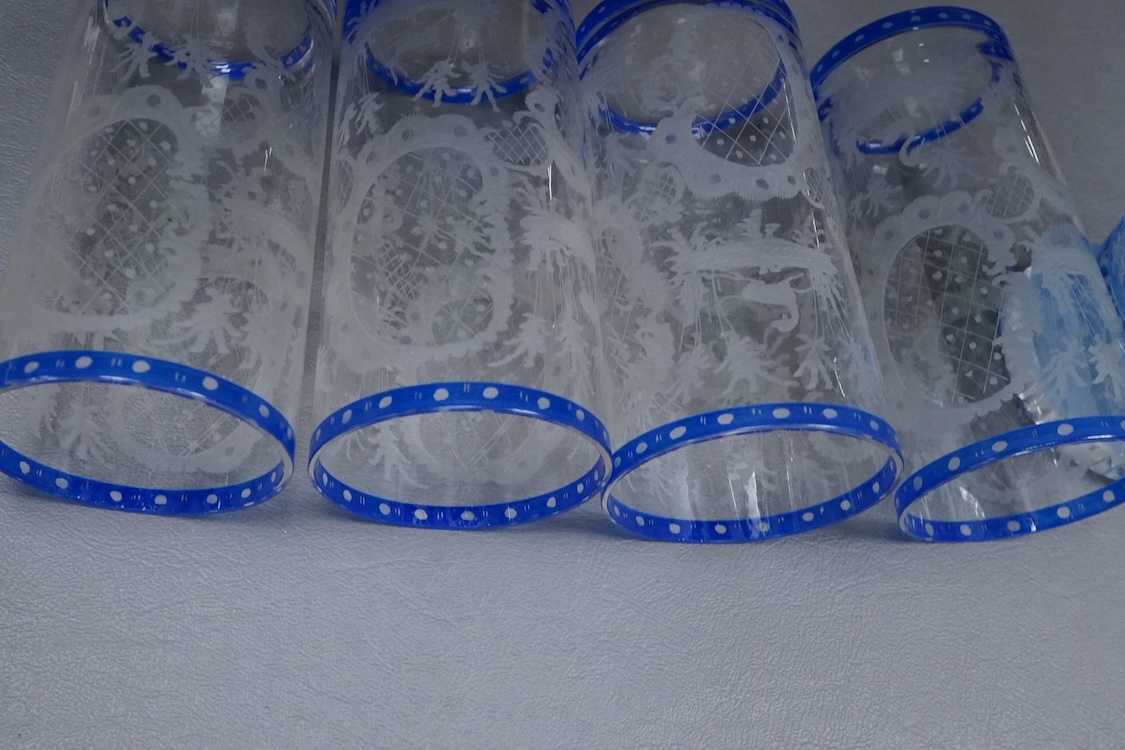 A German engraved blue flashed glass vase and four similar beakers, late 19th/early 20th century, beaker 15cm high.